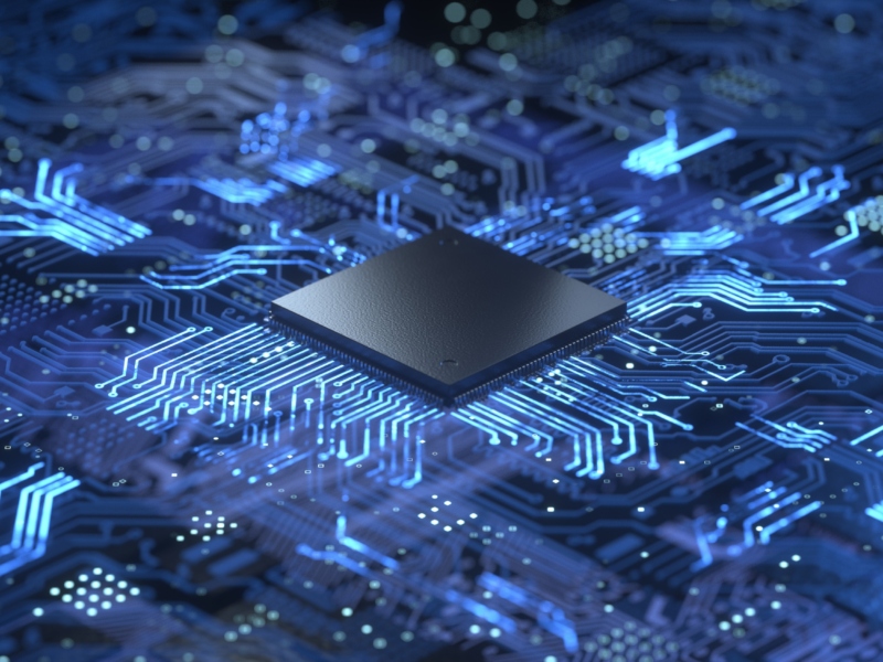 Close-up of a central microchip on a blue printed circuit board with glowing traces.